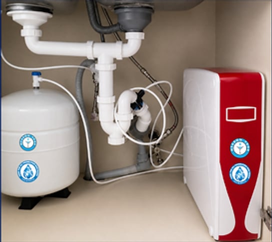 The reverse-osmosis unit installed under a kitchen sink